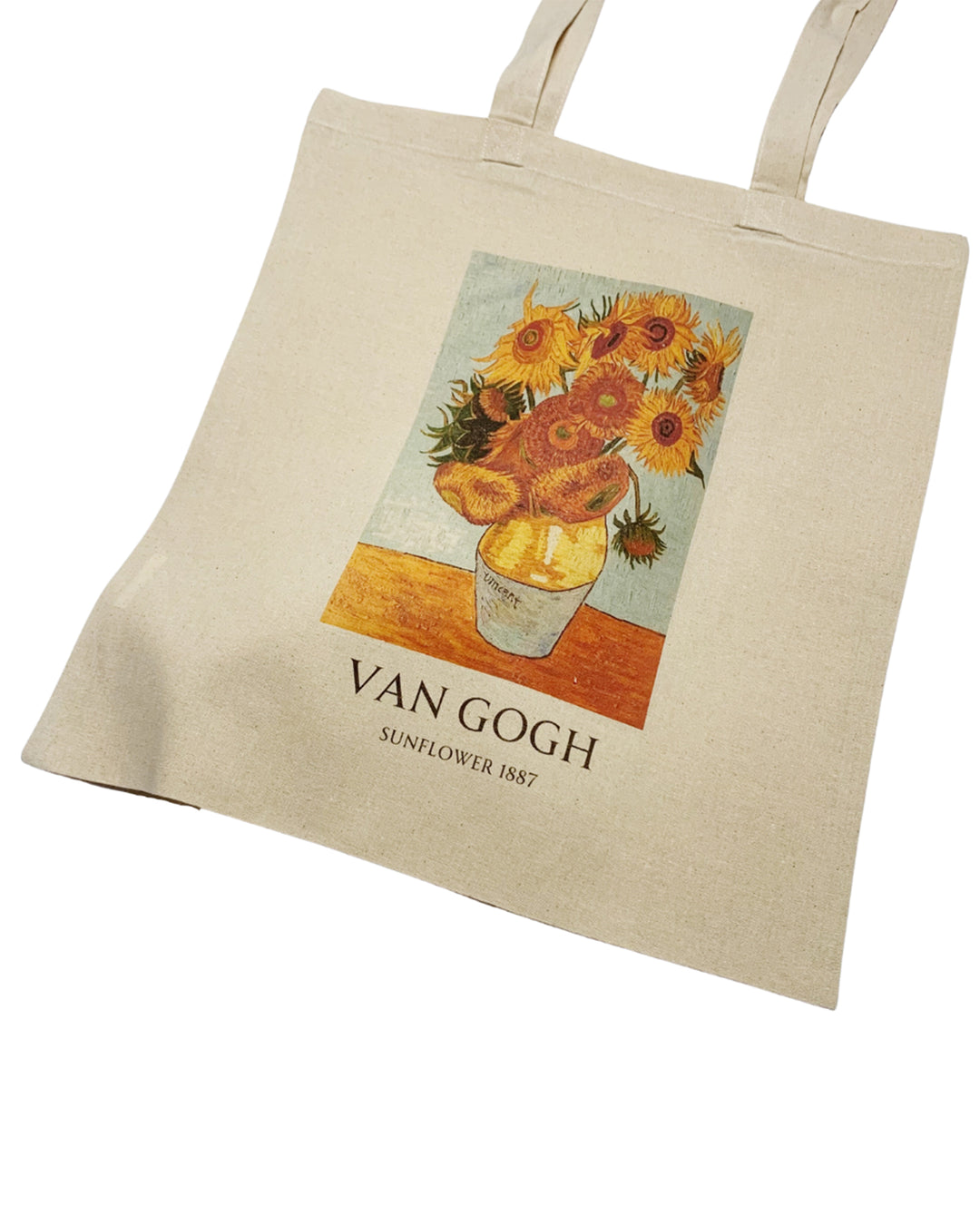 Beige tote bag with Van Gogh sunflower painting print on a white background